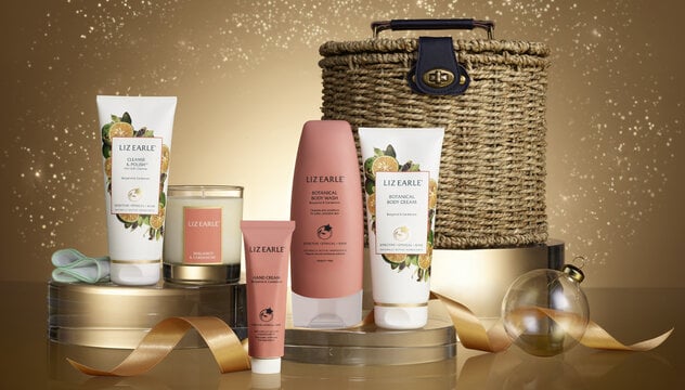 Liz Earle Superskin Collection gift on a gold background