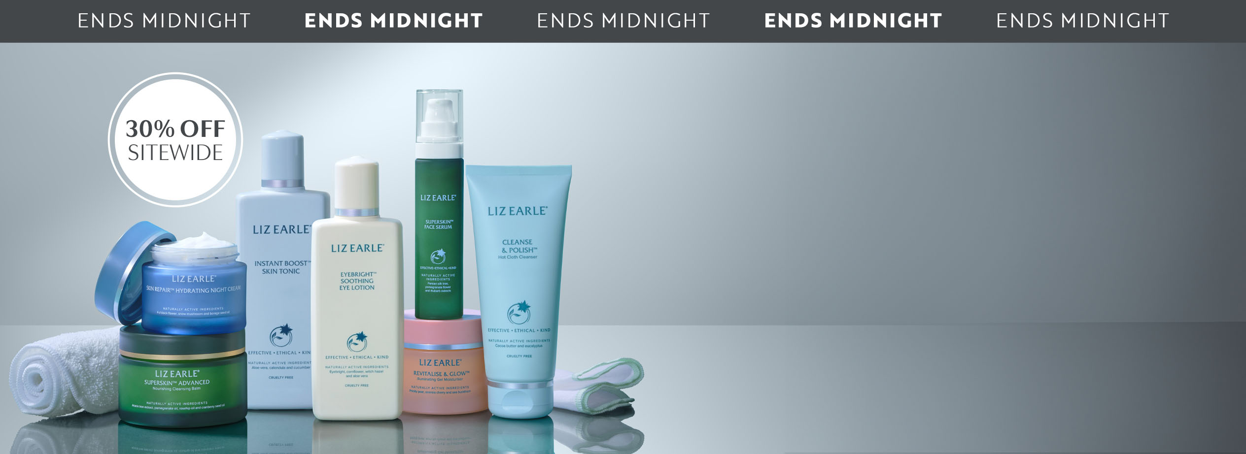 Liz Earle range of products on a grey background